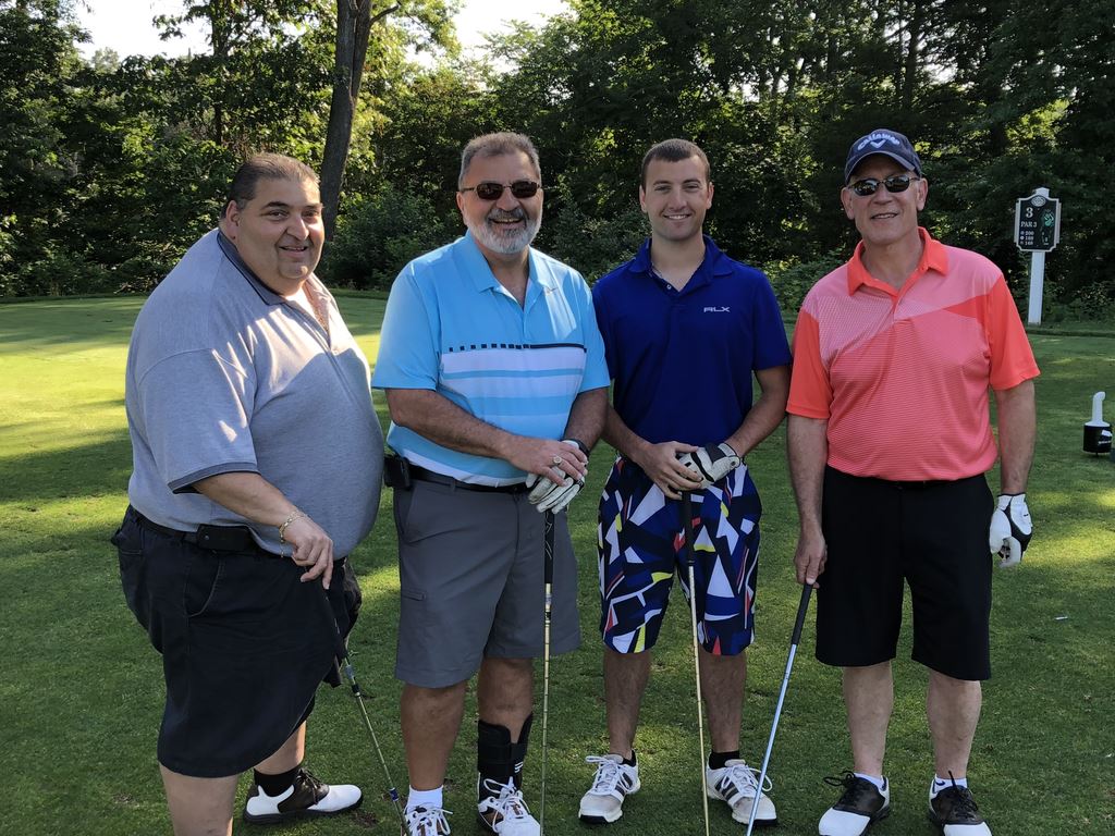 Members at a Metro golf outing